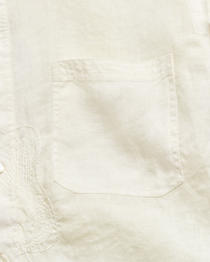 Close-up of a light-colored fabric texture