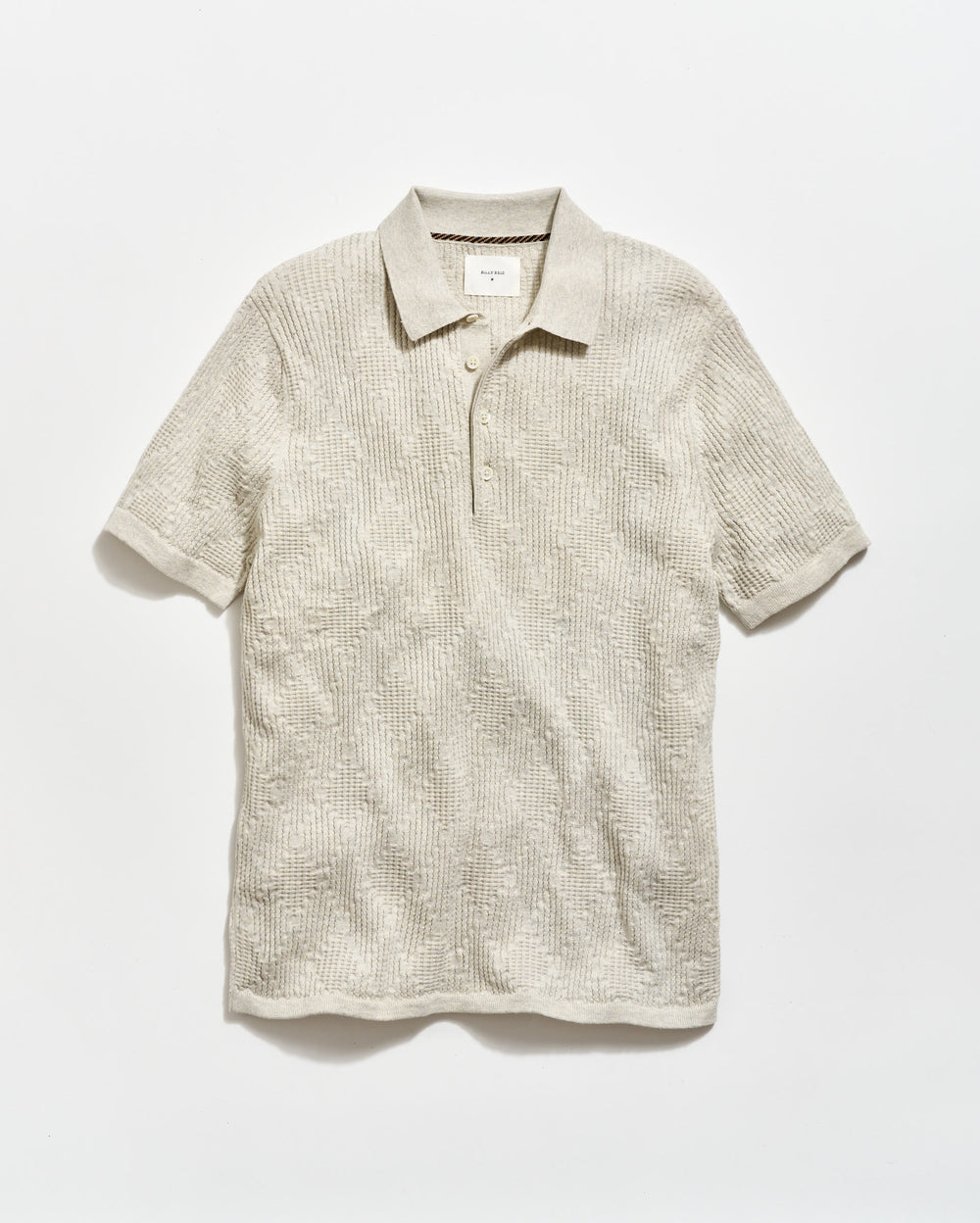 Beige short-sleeve polo shirt on a white background