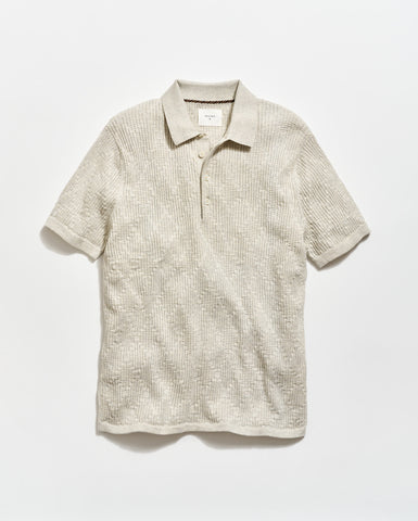 Beige short-sleeve polo shirt on a white background