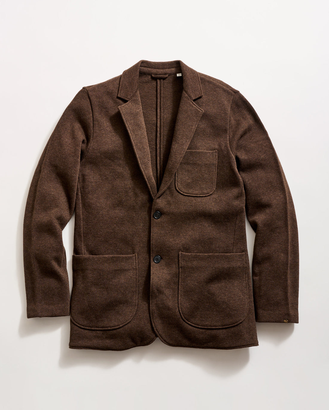 A brown wool blazer with two large front pockets, a chest pocket, and two black buttons, displayed flat on a white background.