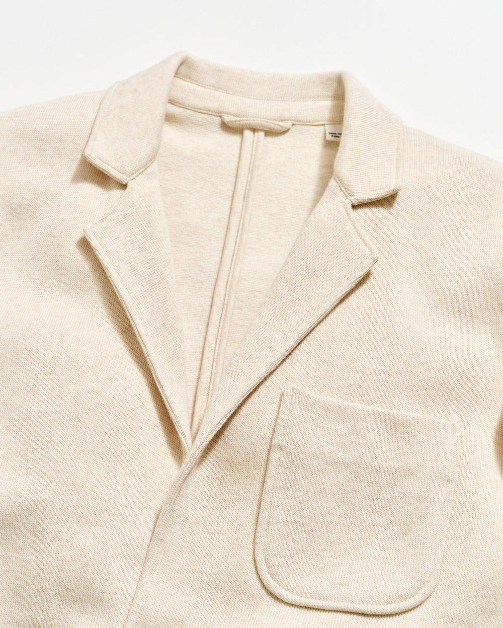 Beige blazer on a light beige background