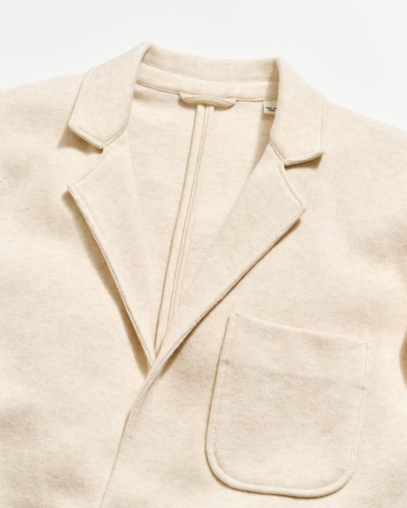 Beige blazer on a light beige background Alternate