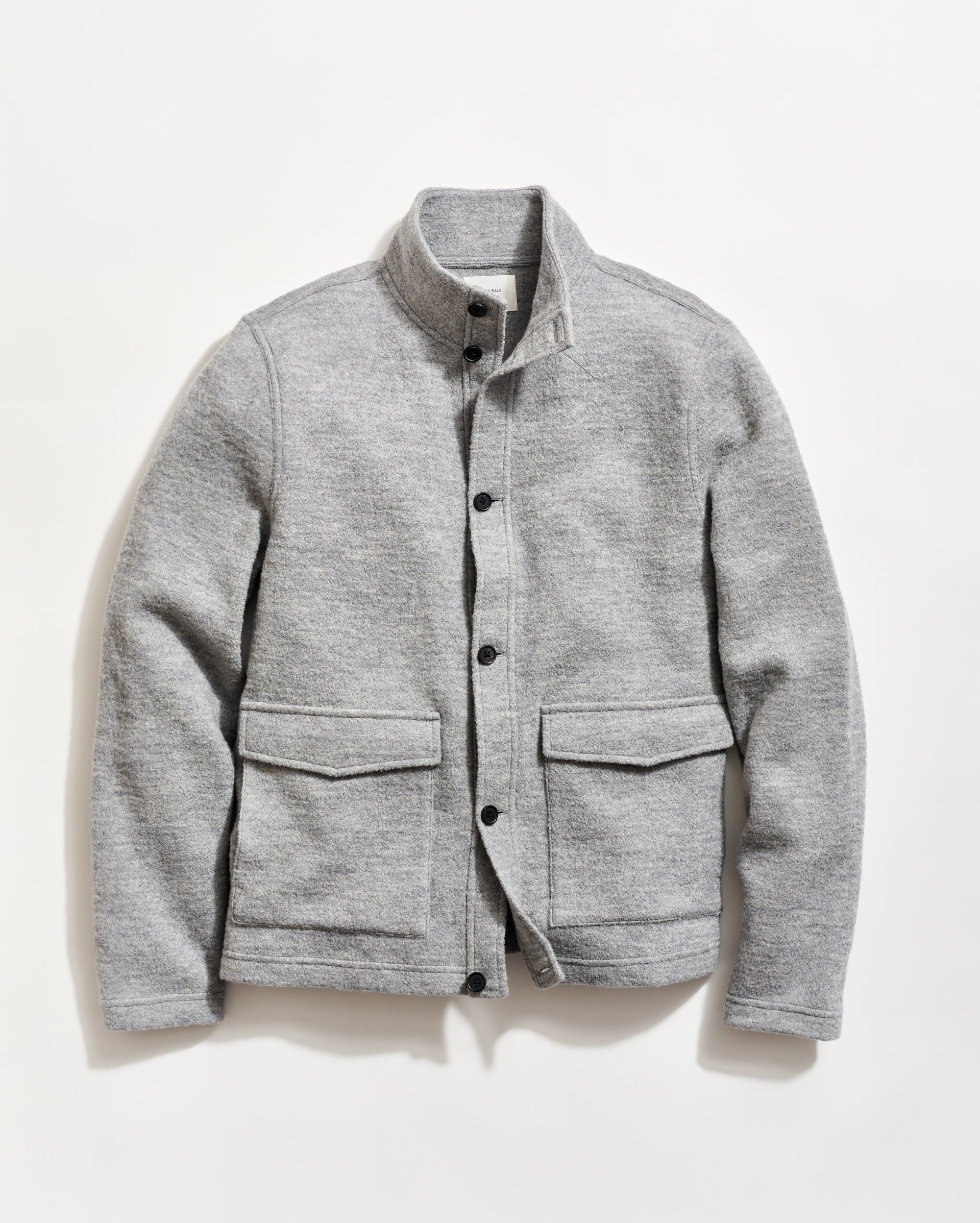 Gray jacket with button details on a white background