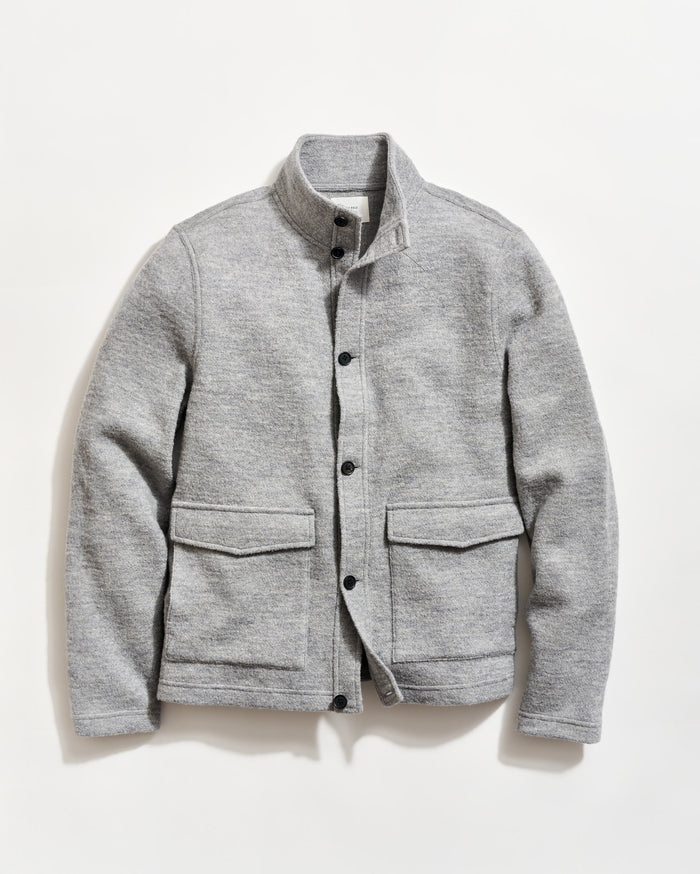 Gray jacket with button details on a white background