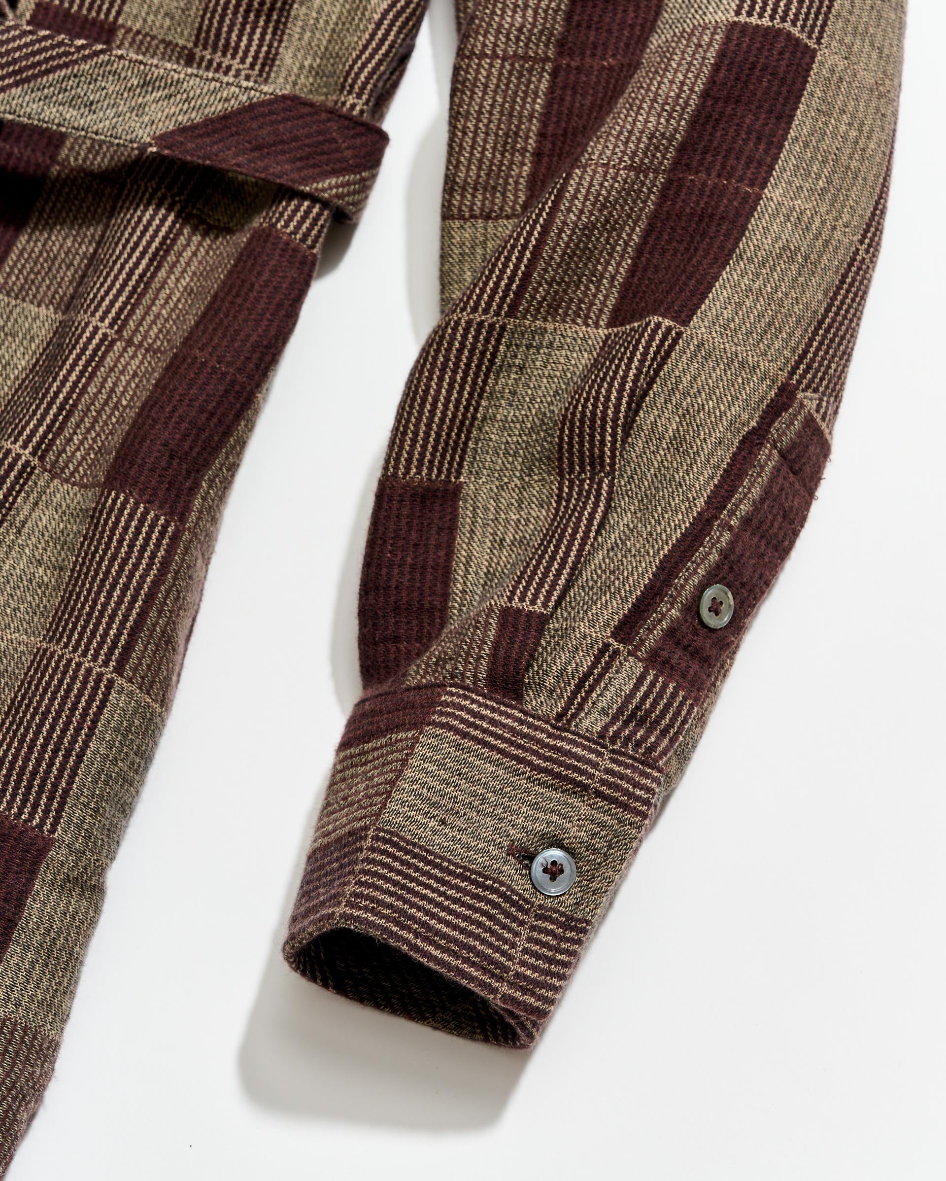 Sleeve with buttons on a white background