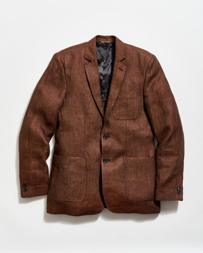 Brown blazer on a light gray background
