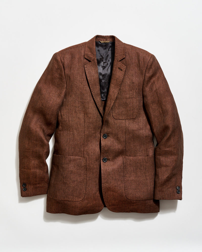 Brown blazer on a light gray background