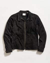 Black jacket with a gold zipper on a light gray background