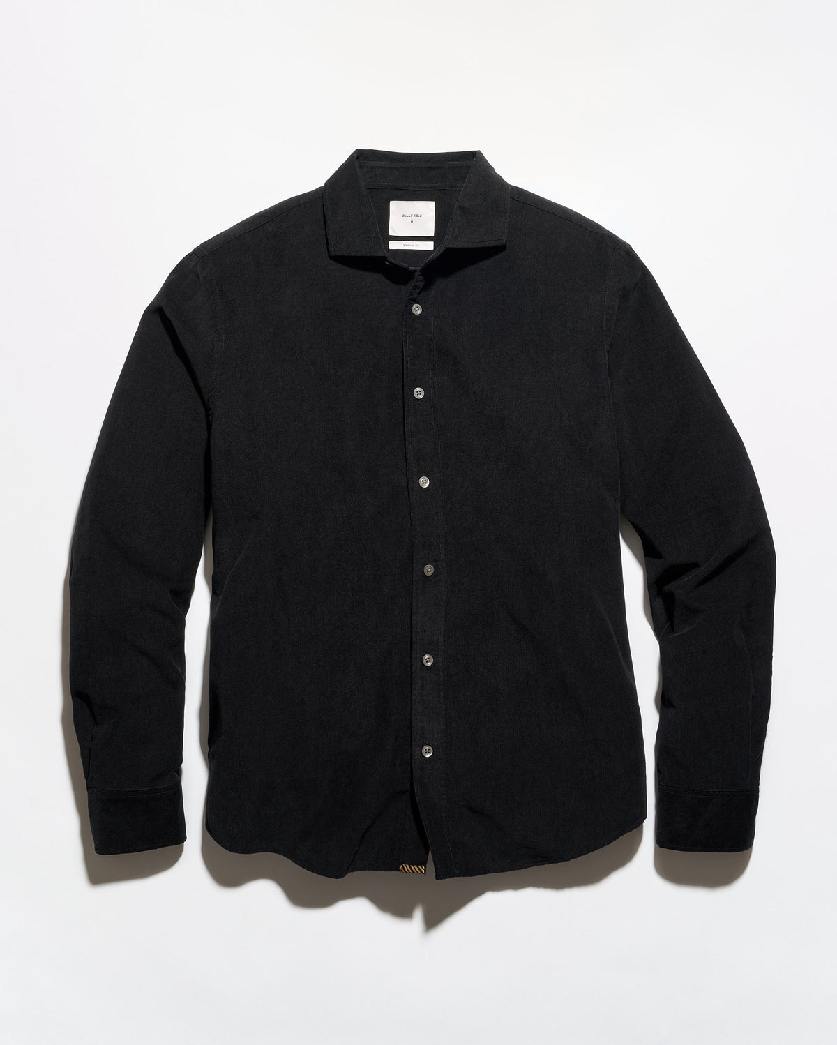 A black long-sleeve button-up shirt with a pointed collar, laid flat against a white background.