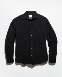 A black long-sleeve button-up shirt with a pointed collar, laid flat against a white background.