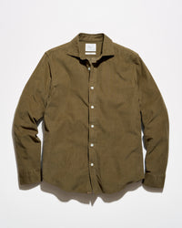 An olive green corduroy button-down shirt with white buttons, laid flat against a white background.
