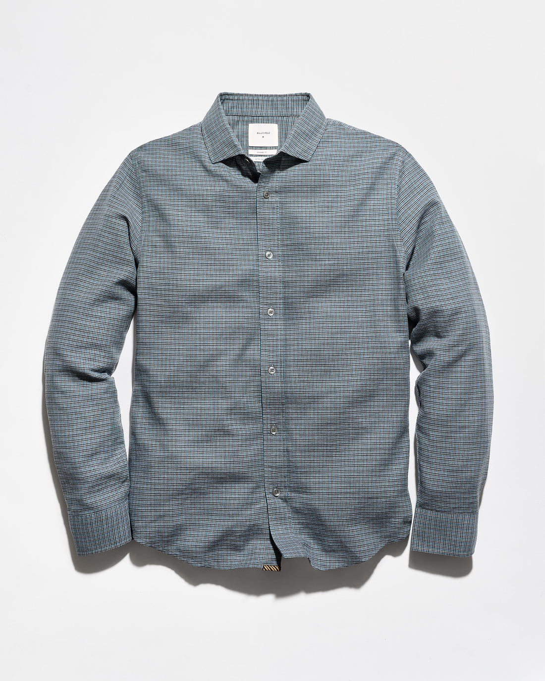A men's long-sleeve button-down shirt in a fine blue and white micro-check pattern, displayed flat against a light gray background.