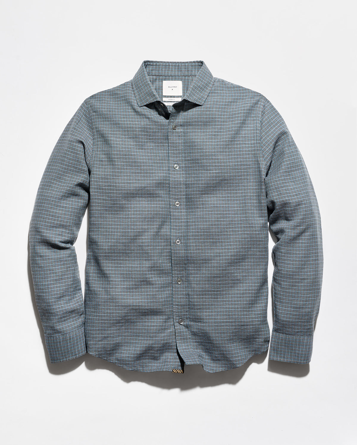 A men's long-sleeve button-down shirt in a fine blue and white micro-check pattern, displayed flat against a light gray background.