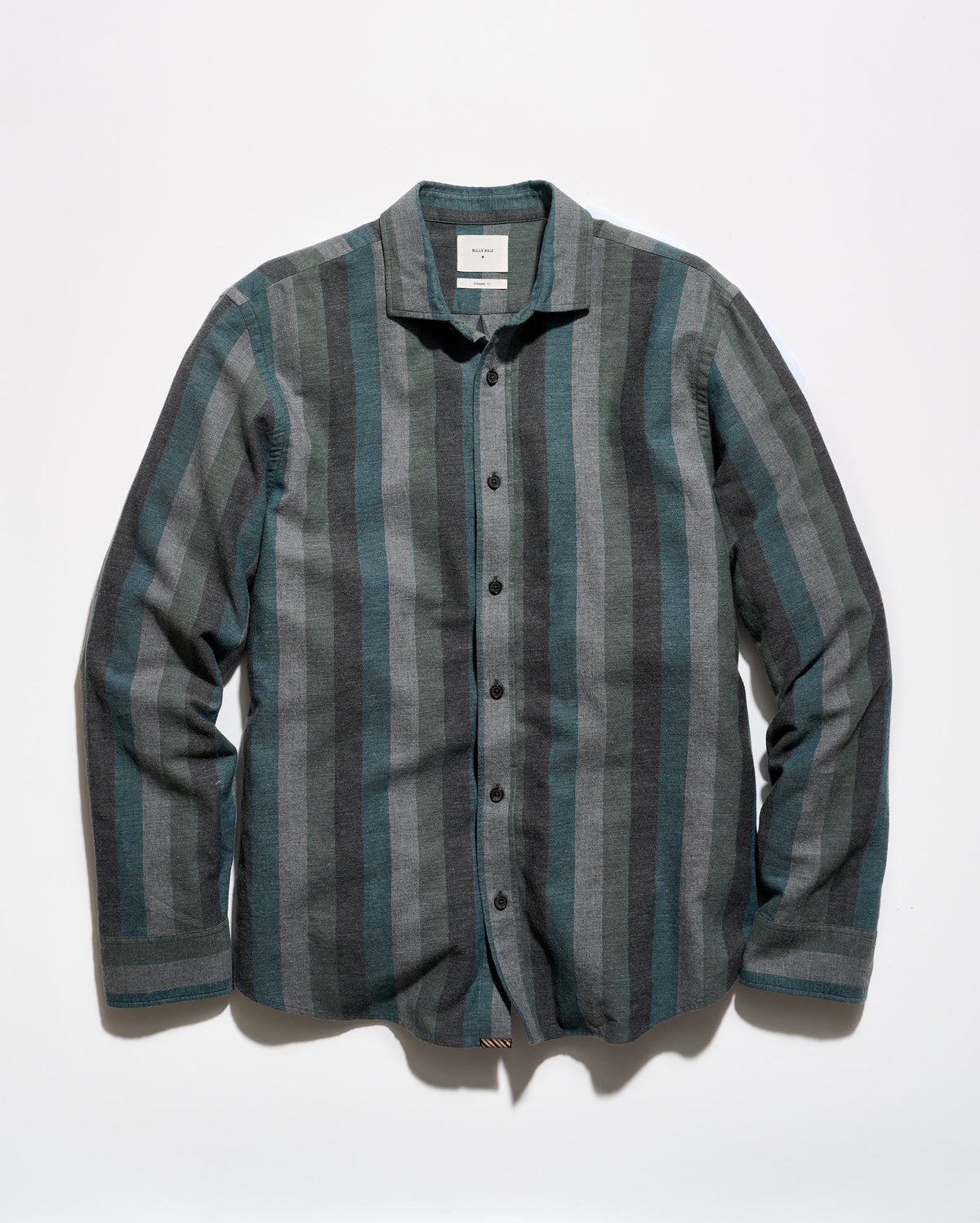 A long-sleeve button-up shirt with vertical stripes in slate blue, gray, and charcoal, laid flat against a white background.