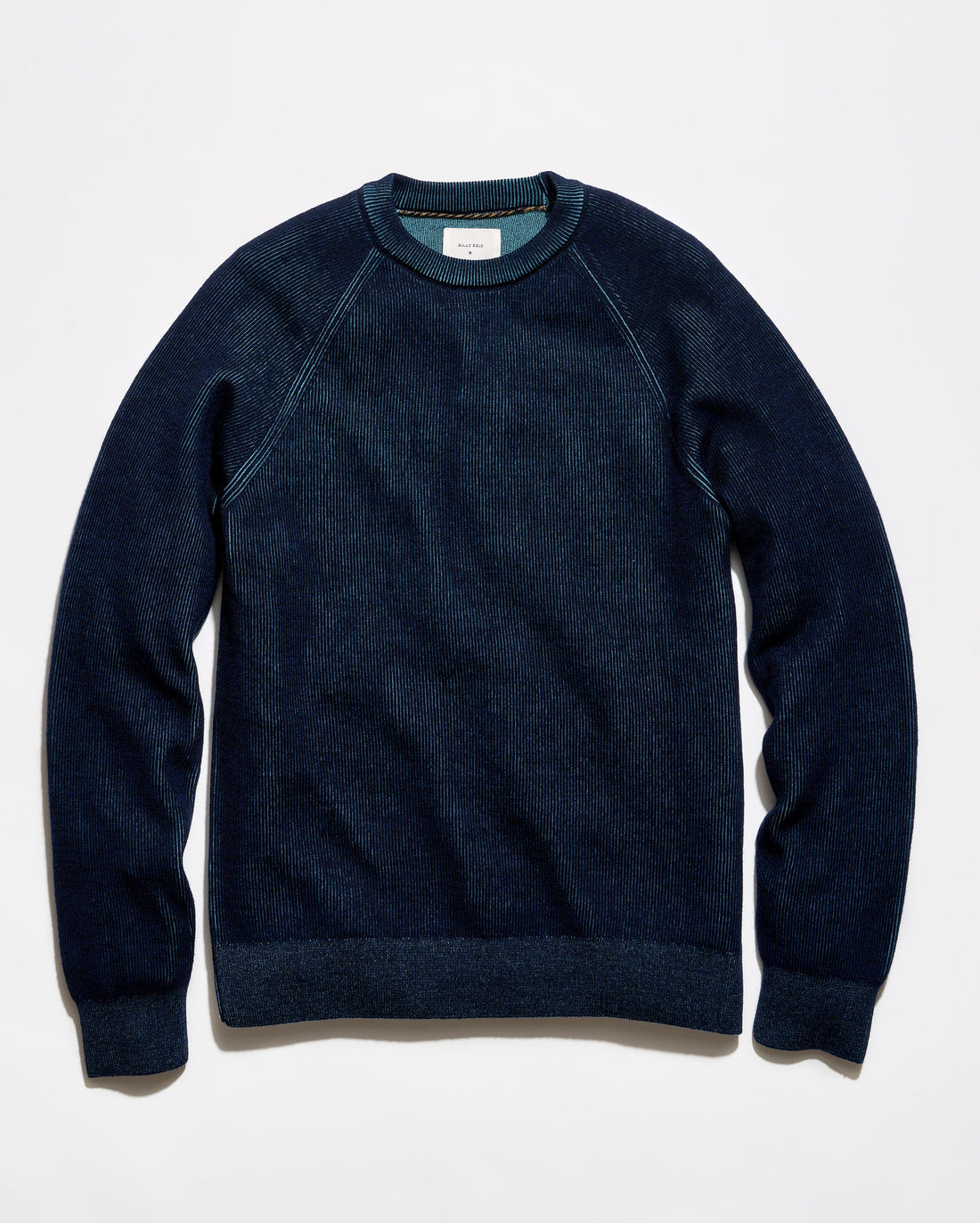 A dark navy blue crewneck sweater with raglan sleeves, laid flat against a clean white background.