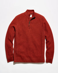 A textured red quarter-zip pullover sweater with a mock neck collar, laid flat against a clean white background.