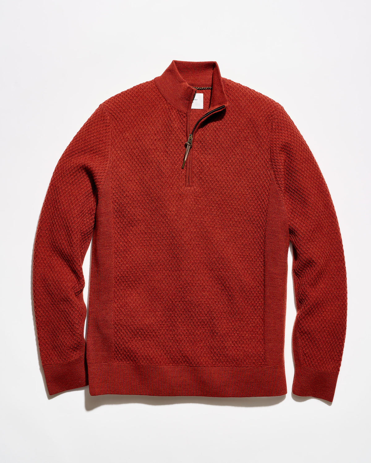 A textured red quarter-zip pullover sweater with a mock neck collar, laid flat against a clean white background.
