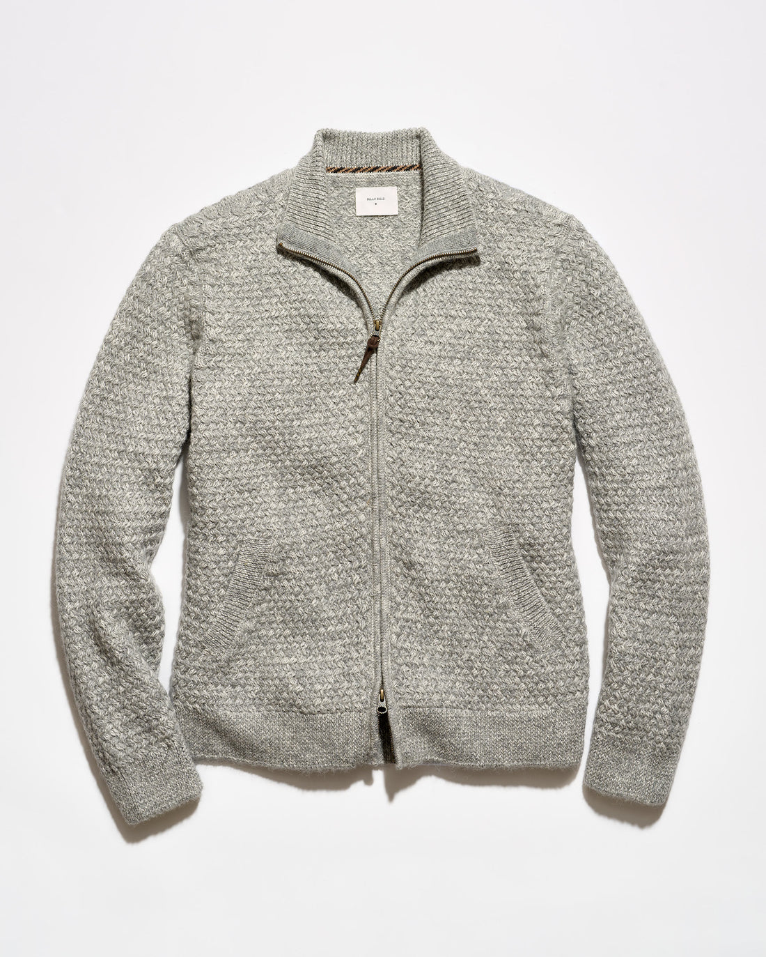 A light gray textured knit zip-up sweater with a mock neck collar, laid flat against a white background.