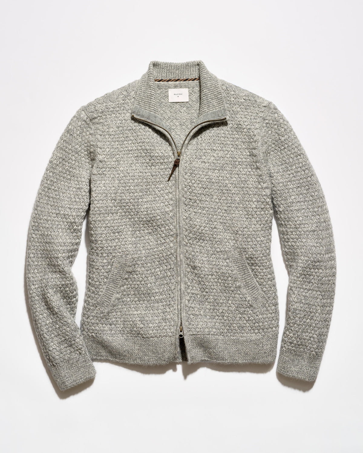 A light gray textured knit zip-up sweater with a mock neck collar, laid flat against a white background.