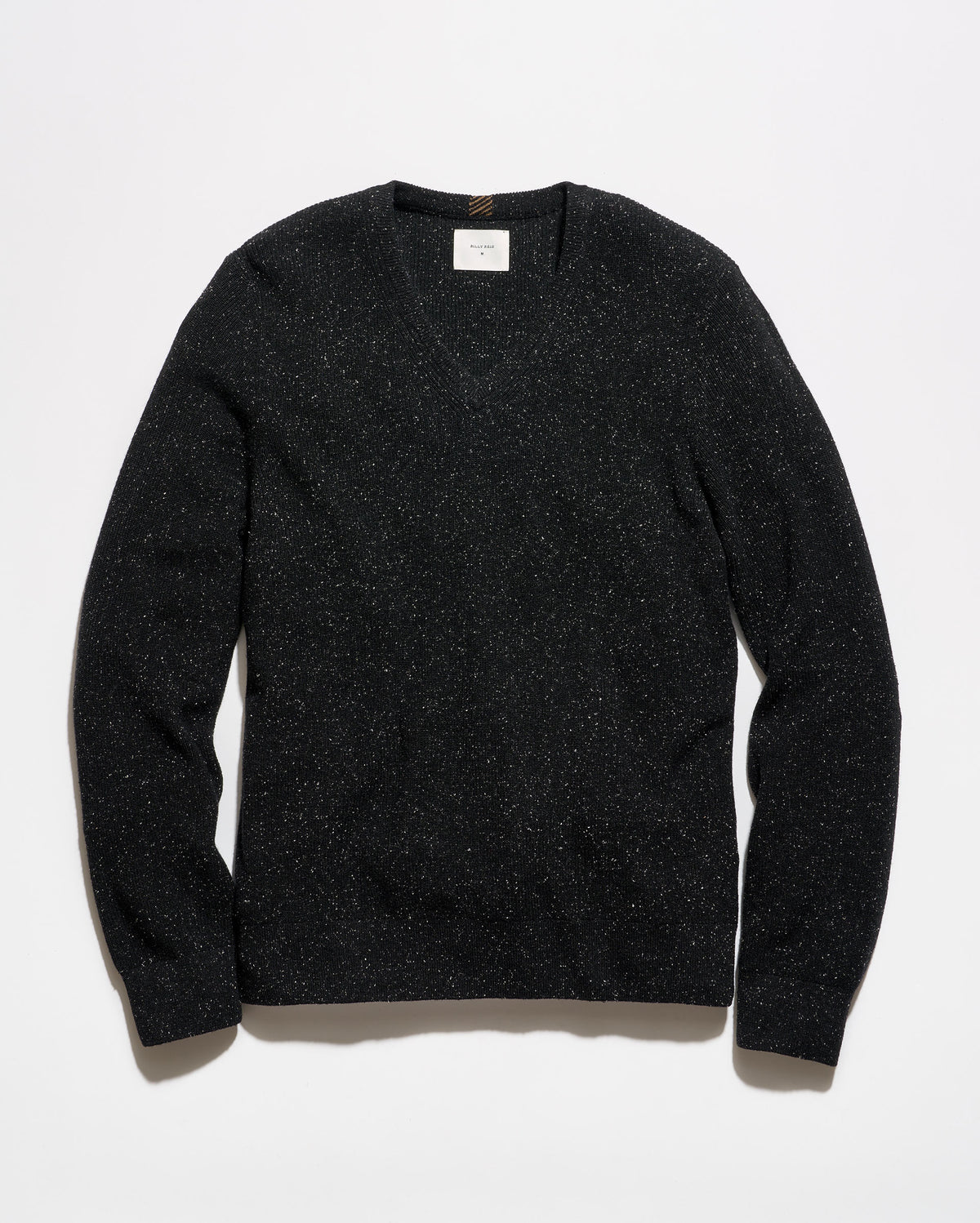 A black long-sleeve crewneck sweater with a subtle speckled texture, laid flat against a clean white background.