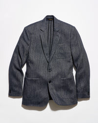 A dark gray textured wool-blend blazer with a subtle heathered pattern, featuring notch lapels, a two-button front closure, and flap pockets, displayed against a clean white background.