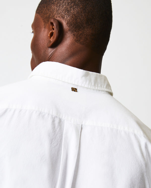 Male model wears the MSL 1 Pocket Shirt in White