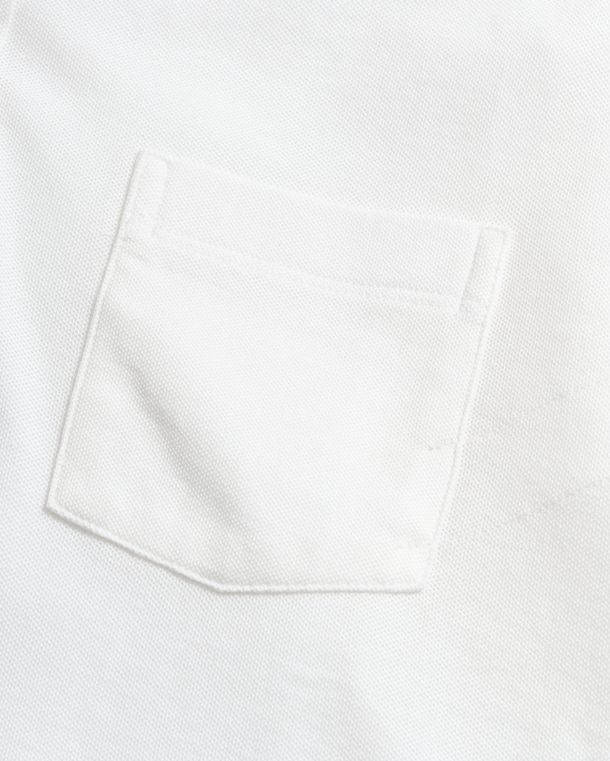 Close-up of a white pocket on a white background