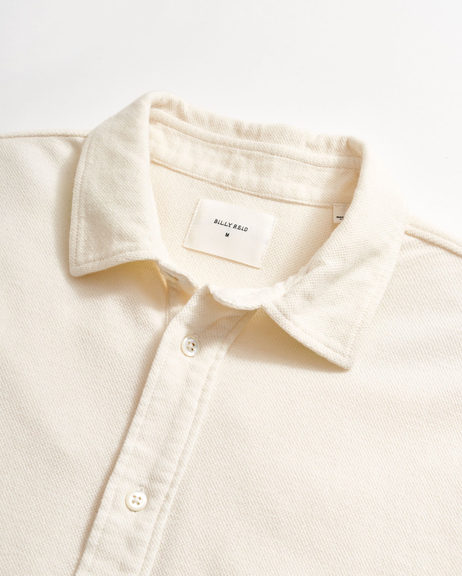 104-719Long sleeve knit yellowhammer shirt in tinted white