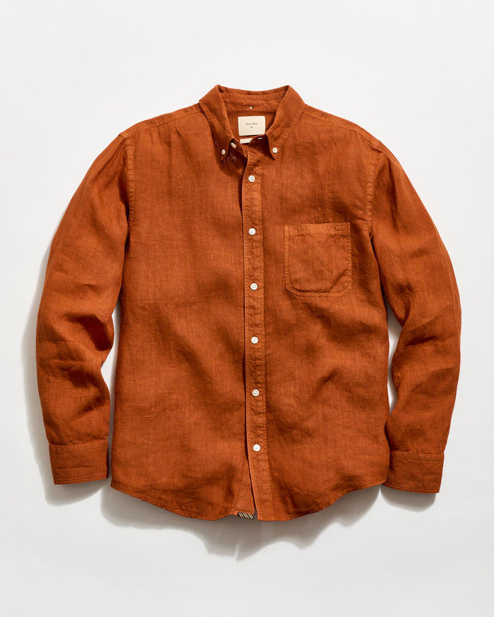 Brown button-up shirt on a white background