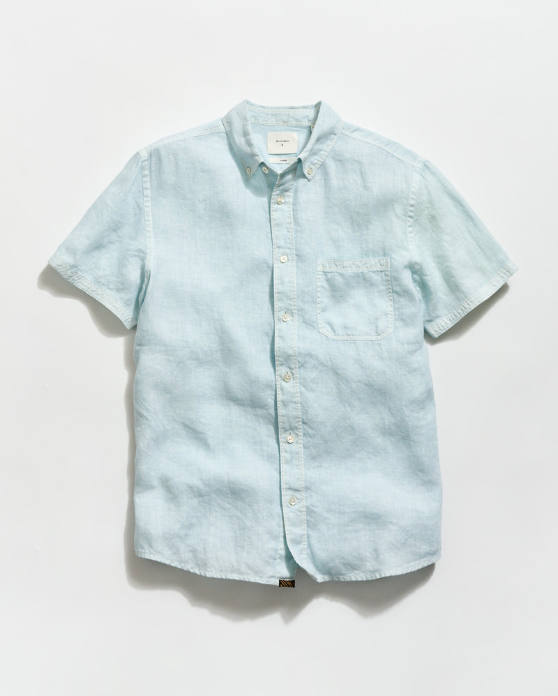 Light blue denim shirt on a white background