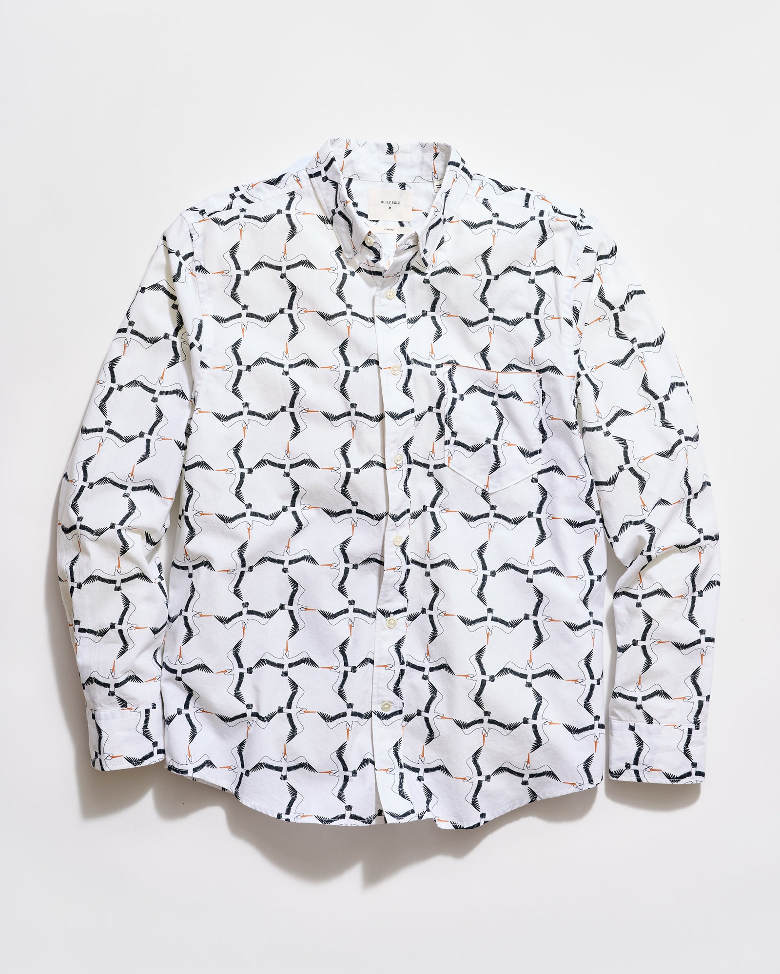 White shirt with black geometric pattern on a white background