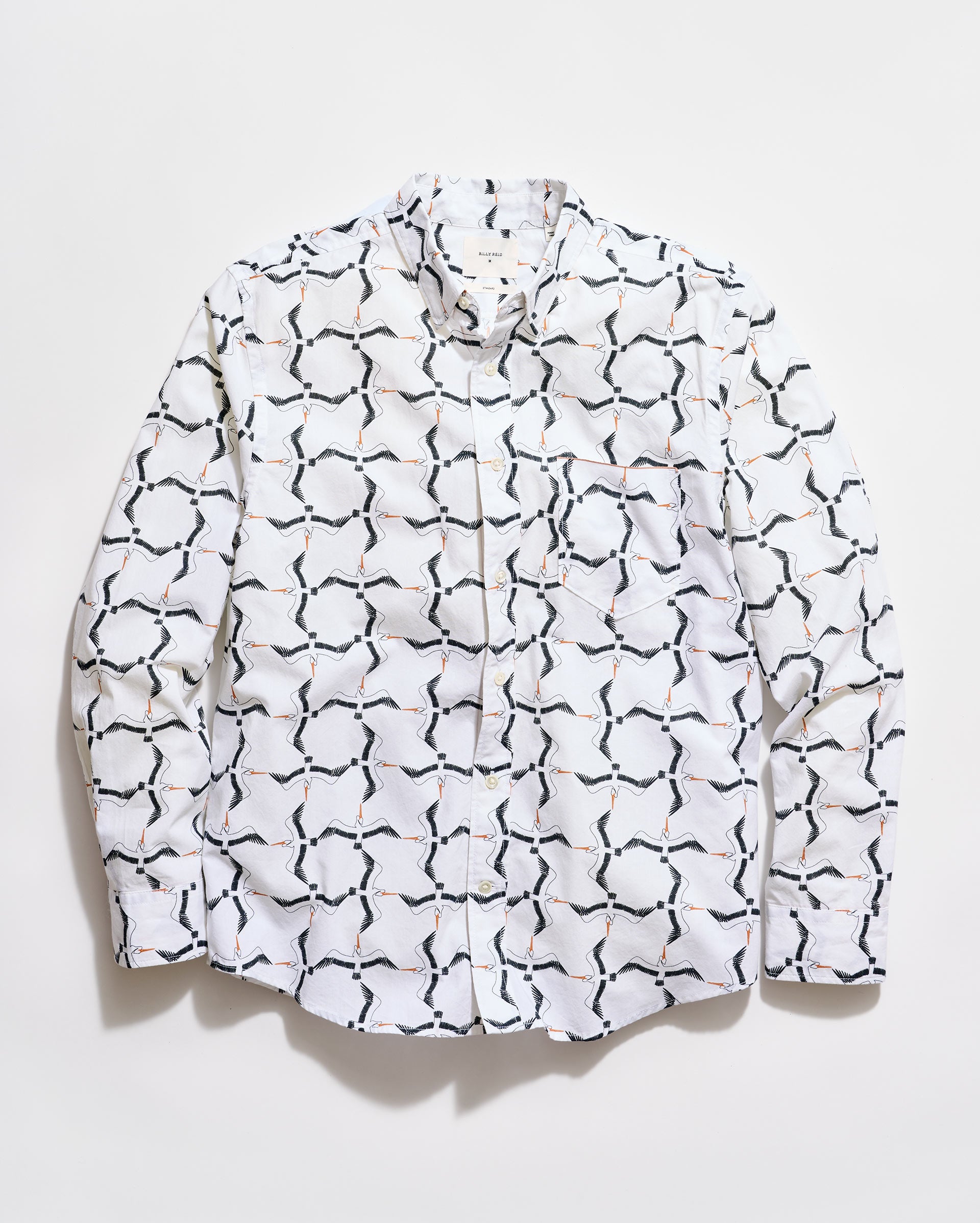 White shirt with black geometric pattern on a white background