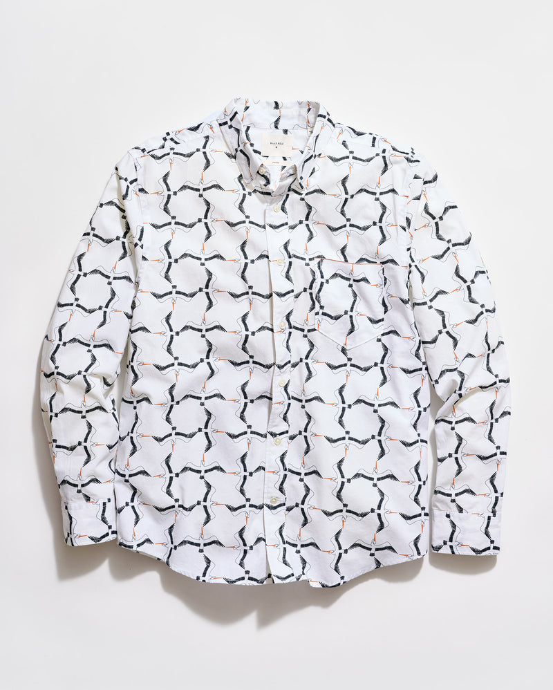 White shirt with black geometric pattern on a white background