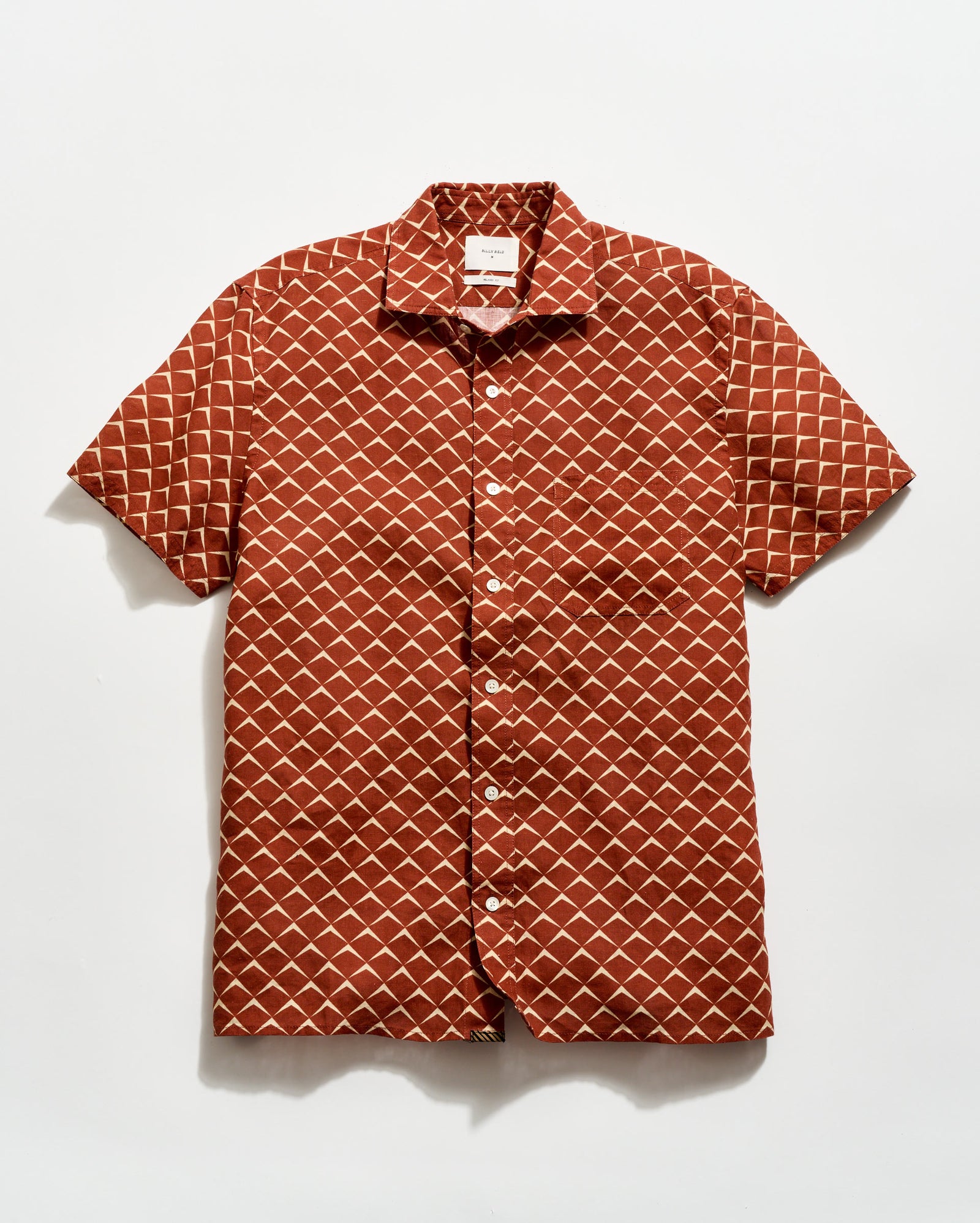 Short-sleeve shirt with geometric pattern on a white background
