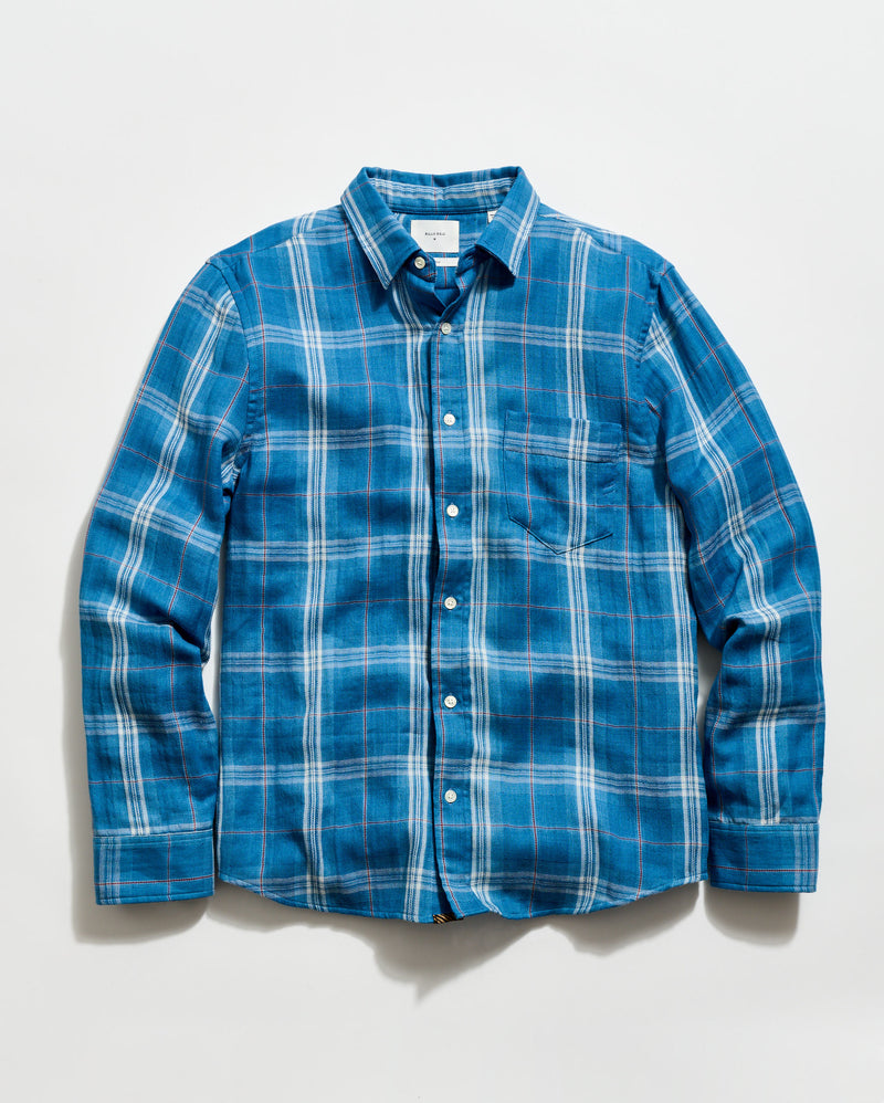 Blue plaid shirt on a white background