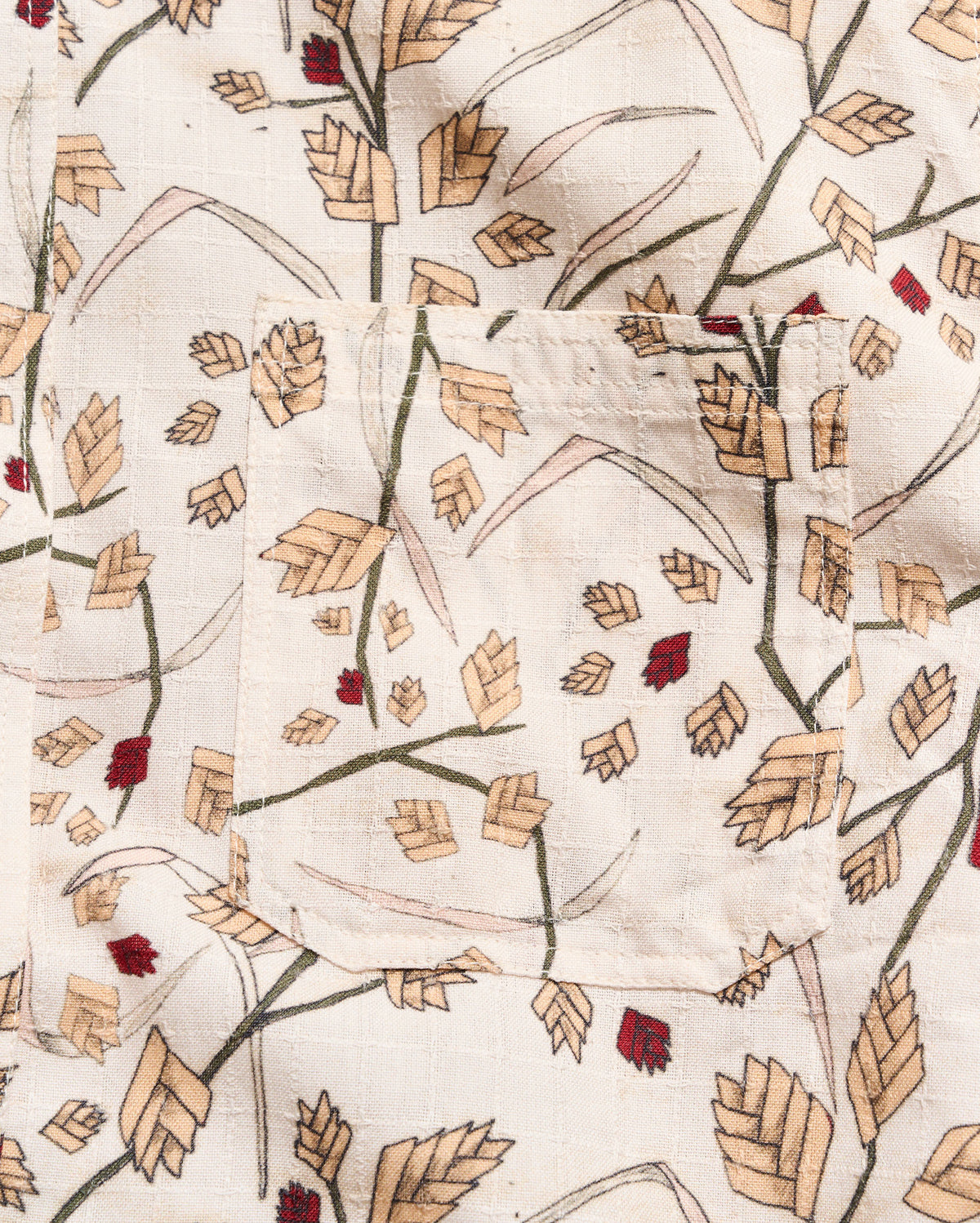 Textile with leaf pattern on a beige background