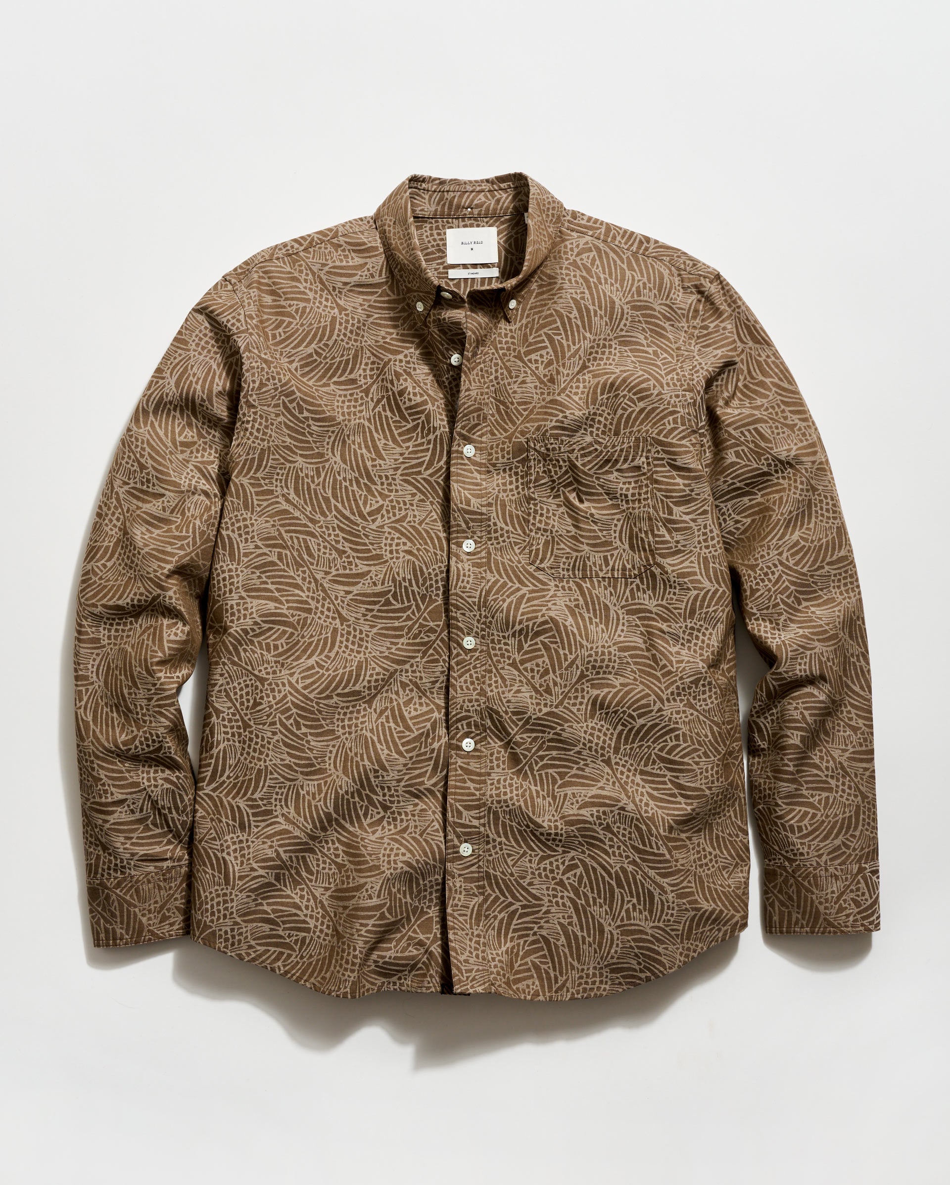 Brown patterned shirt on a white background