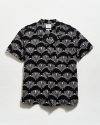 Black shirt with white geometric pattern on a white background