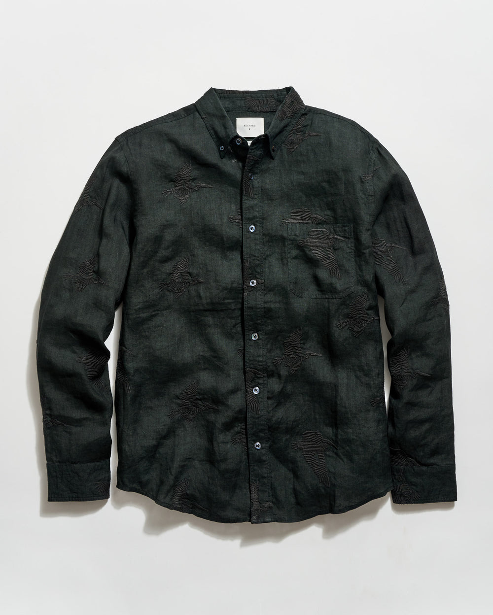 Black button-up shirt on a light gray background