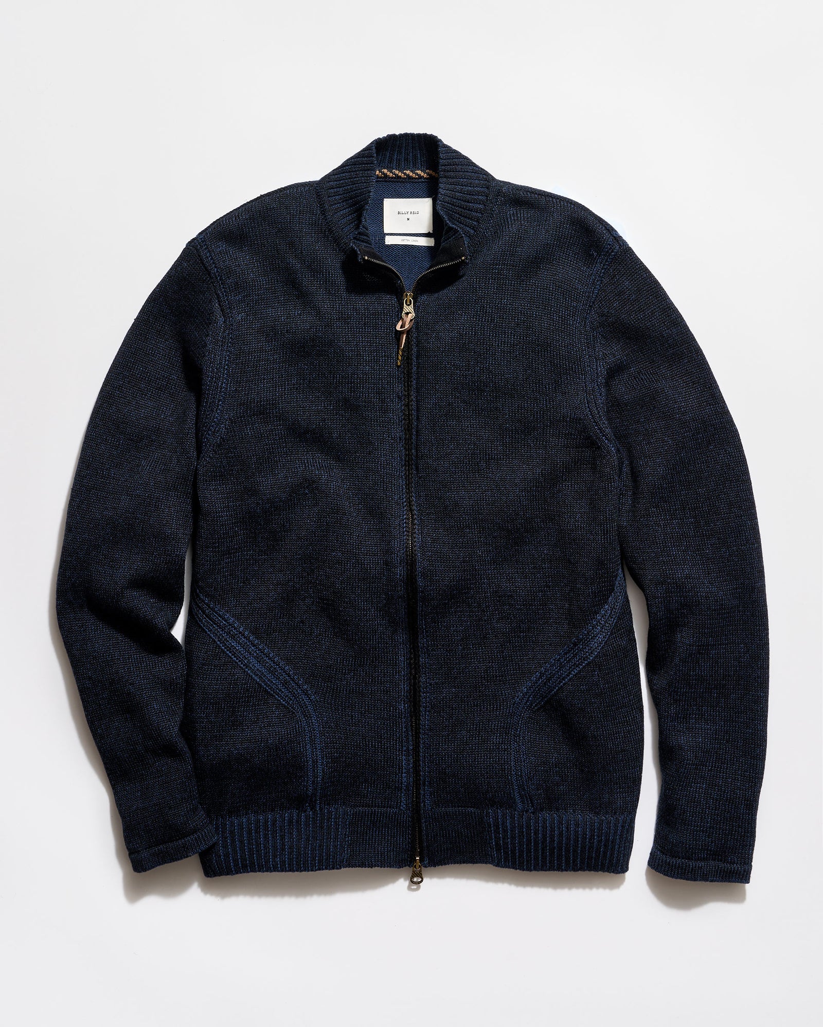 Dark blue zip-up sweater on a light gray background