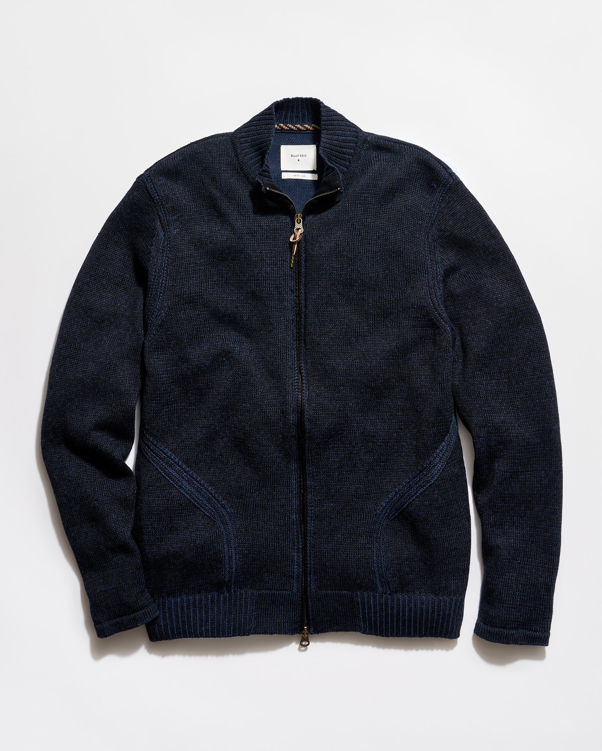 Dark blue zip-up sweater on a light gray background