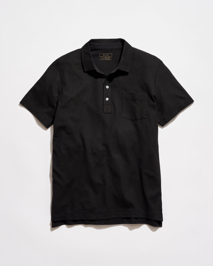 Black polo shirt on a light gray background