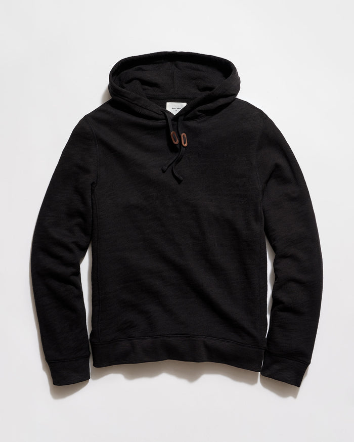 Black hoodie on a light gray background