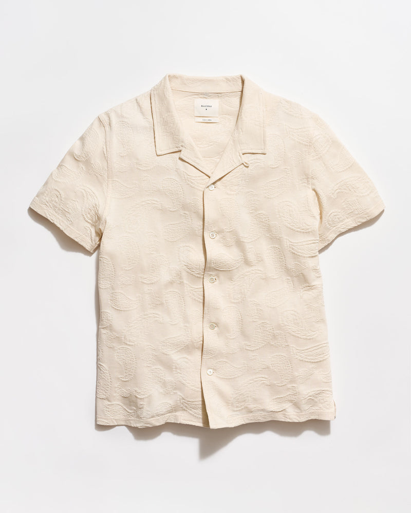 Beige linen shirt on a white background