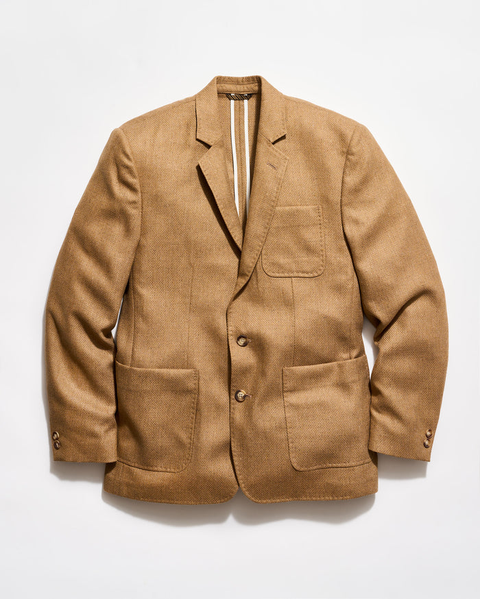 Brown blazer on a light gray background