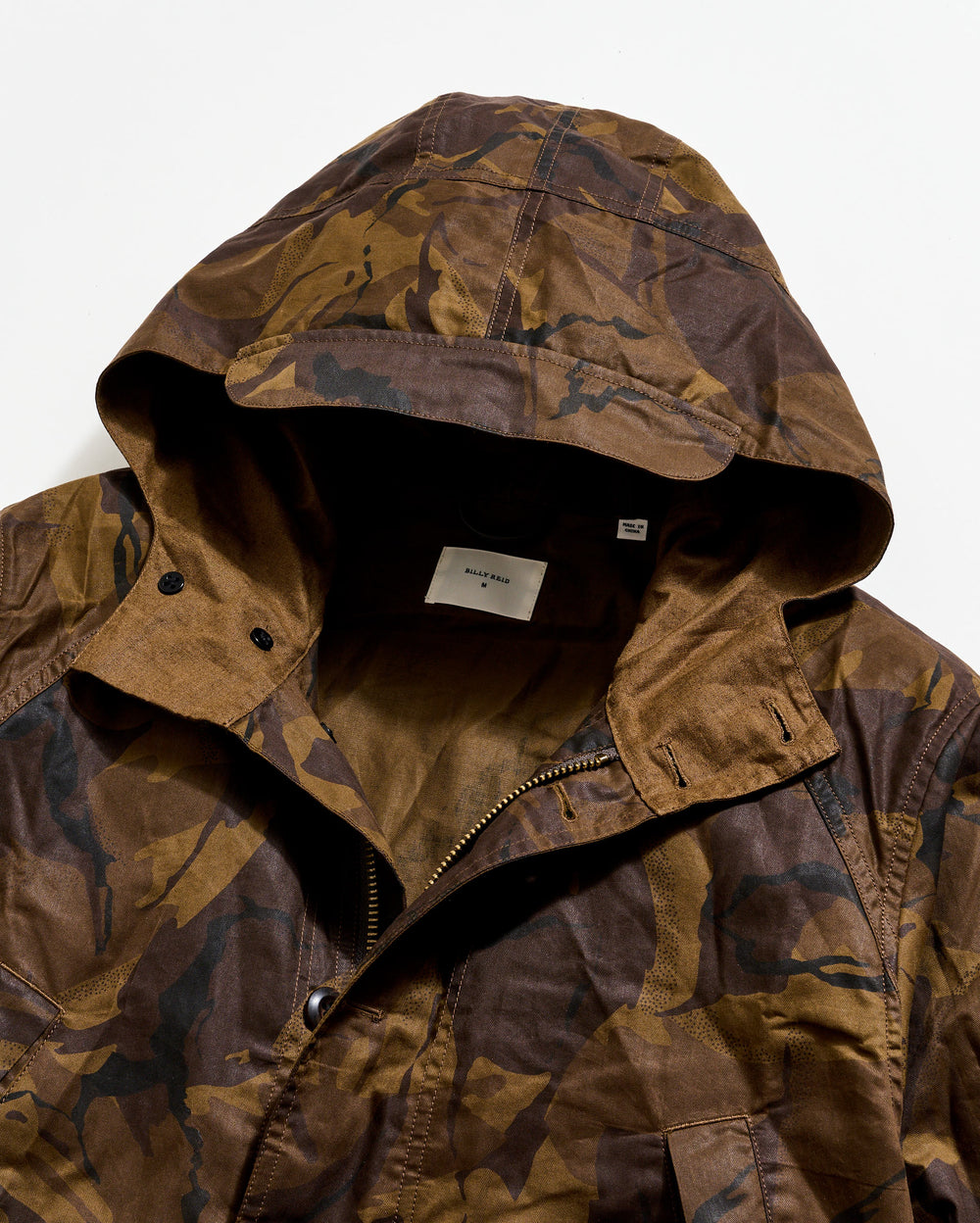 Camouflage jacket with a hood on a white background