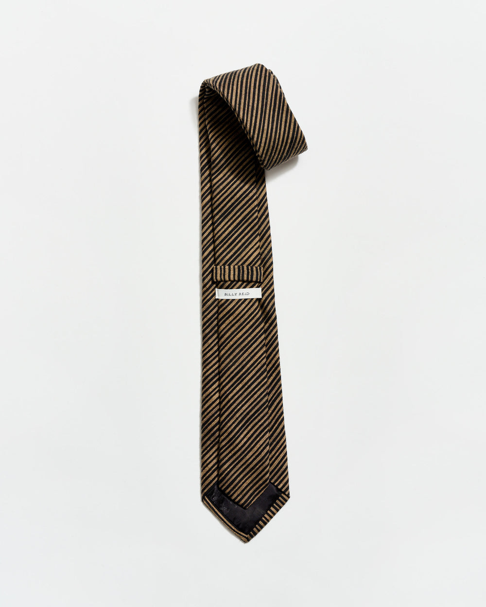 Striped tie with a pocket square on a white background