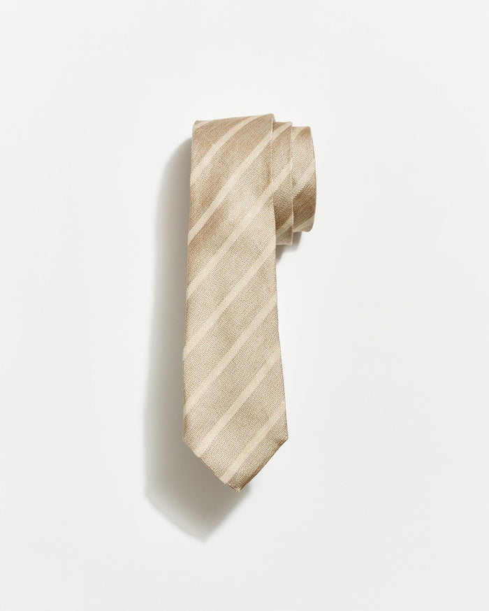 Beige striped tie on a white background