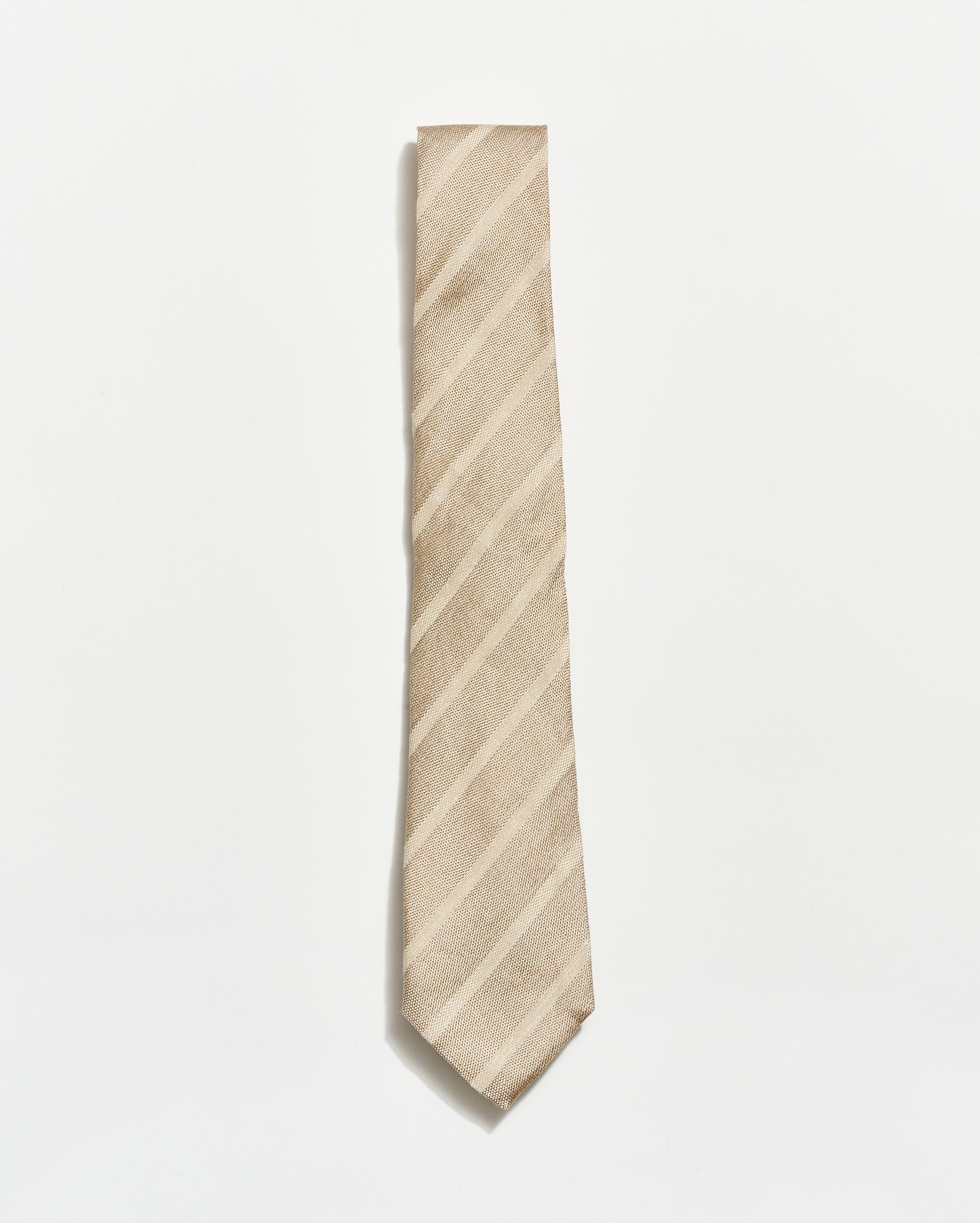 Beige striped tie on a white background