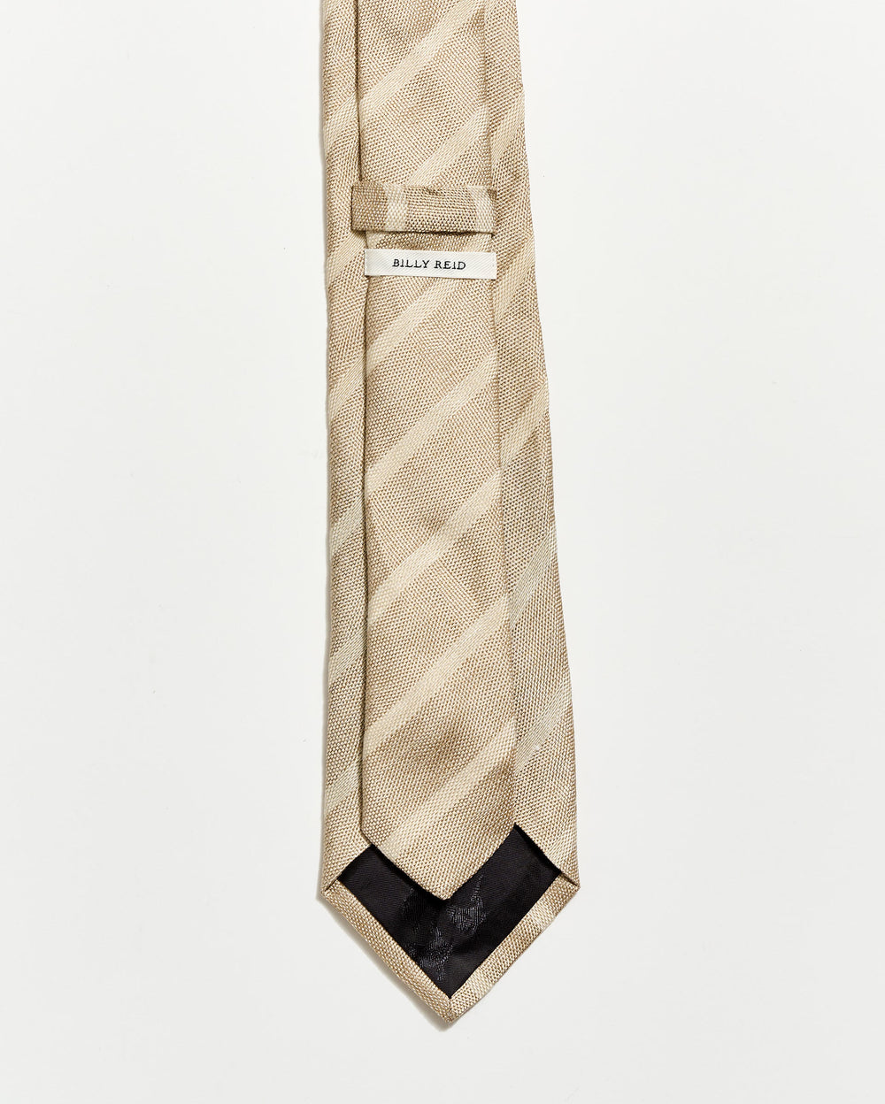 Beige striped tie with a brand label on a white background